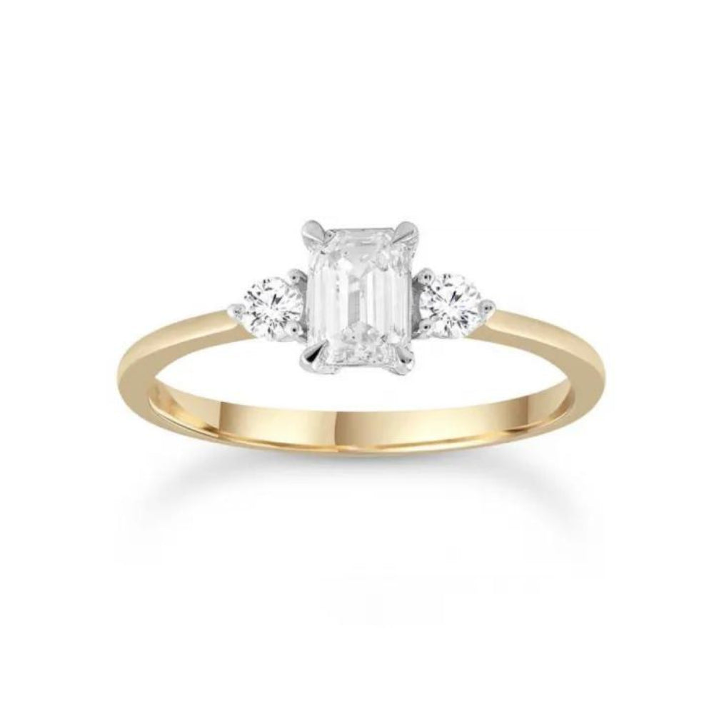 9k Yellow Gold Emerald Cut Three Stone Diamond Ring