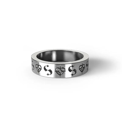 It's a classic for a reason. Celestial hearts combine with their S-logo in their new imprint band. This narrow band style ring is made from sterling silver with dark oxidised detailing.