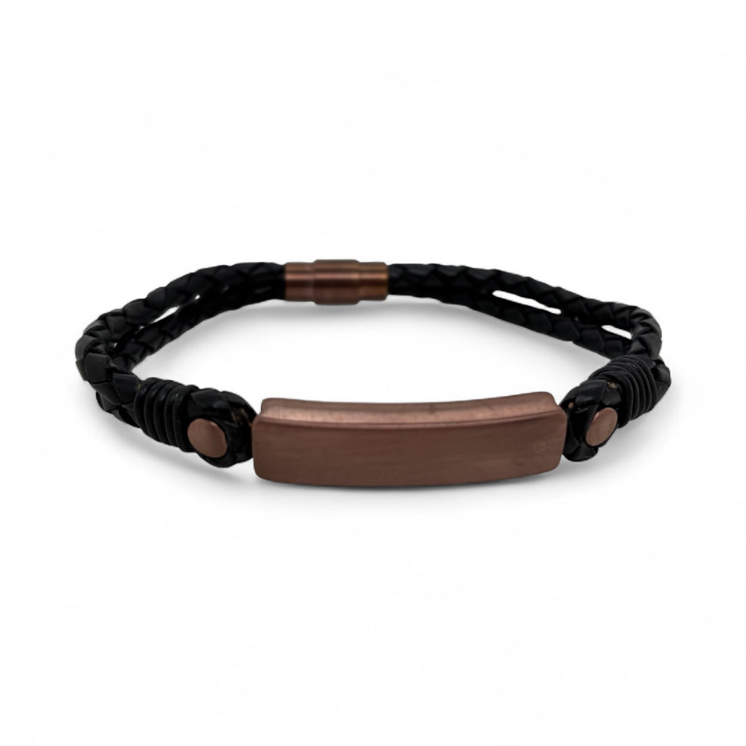 Revolution Black plaited leather bracelet with bronze-coloured panel and safety clasp.